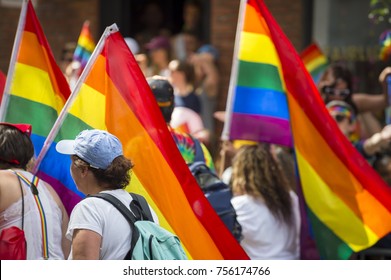 People With Rainbows Flags In The Annual Pride Parade As It Passes Through Greenwich Village.