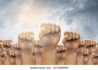 People Raised Fist Air Fighting For Their Rights,labor Movement Concept,Labour Day Concept,Workers Marched To Claim The Benefits.