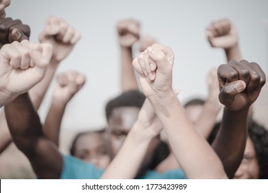 People Raised Fist Air Fighting For Their Rights. Labor Movement, Election Movement, No Racism And Union Concept. Image