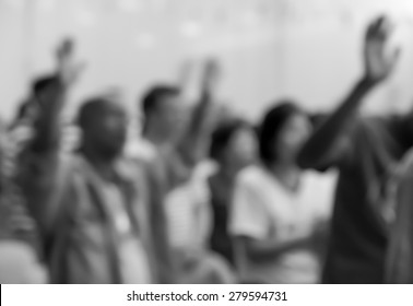 People raising hands to worship with singing choir for religion background - Shutterstock ID 279594731