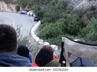 With people in a rally car 