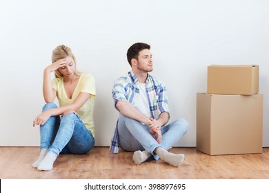 People, Relationship Difficulties, Divorce, Conflict And Family Concept - Unhappy Couple Having Argument Or Break Up At Home