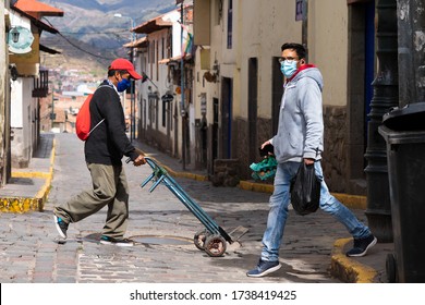 People In Respiratory Masks Are Going To Buy Food In Empty Street During Coronavirus Pandemic In Latin South America. Epidemic Of Covid-19