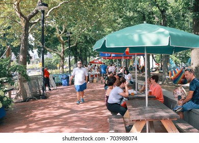 People Rest In The Park For Leisure Harbor Park, Philadelphia, PA, USA. August 26, 2017.