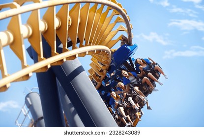 People riding amusement park ride
