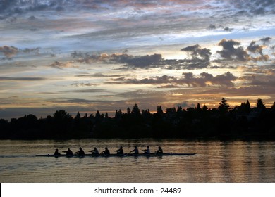 people rowing on green lake at sunrise in seattle washington - Powered by Shutterstock