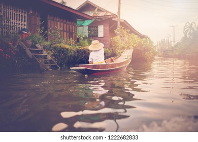 
People rowing in the river. - Powered by Shutterstock