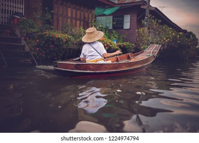 
People rowing in the river. - Powered by Shutterstock