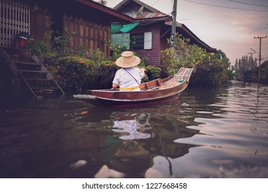 
People rowing in the river. - Powered by Shutterstock