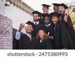 People, selfie and graduation or smile on campus, memory and picture for silly graduate or diploma. Funny face, students and university achievement or social media post, scholarship and celebration