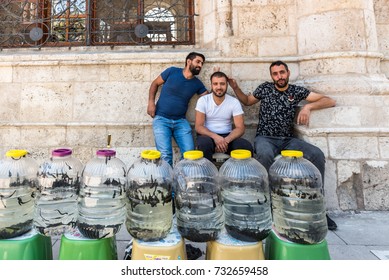 People sell Medical leeches in plastic bottles.Sucking leeches for veins cleaning in human body:procedure of hyrudotherapy,hirudotherapy (Medicinal leech therapy),Konya,Turkey.28 August 2017