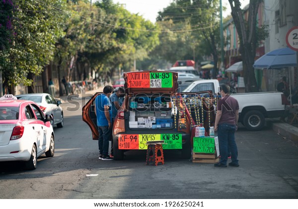 People selling products to avoid\
the spread of coronavirus, Mexico. Mexico City. February 27,\
2021