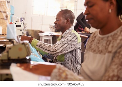 People Sewing At A Community Project Workshop, South Africa