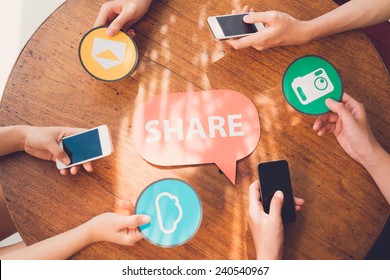 People Sharing Files Via Smartphones: Internet And Technology Concept