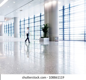 People Silhouette In Hall Of Office Building