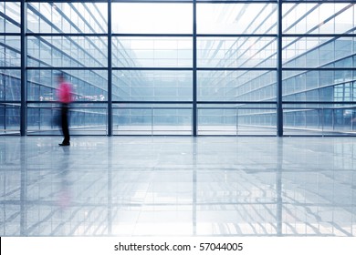 People Silhouette In Hall Of Office Building