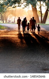 People Silhouette In Sunset