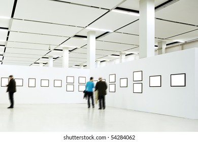 People Silhouettes In The Museum Interior