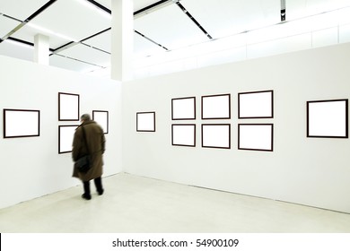 People Silhouettes In The Museum Interior