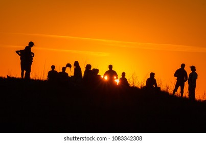 People Silhouettes On Sunset Stock Photo (Edit Now) 1158406246