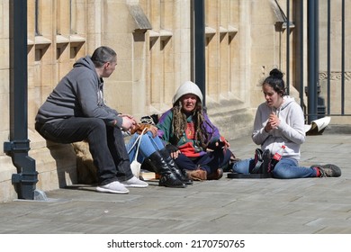 People Sit On A City Centre Street Enjoying A Sunny Day On May 3, 2016 In Bath, UK