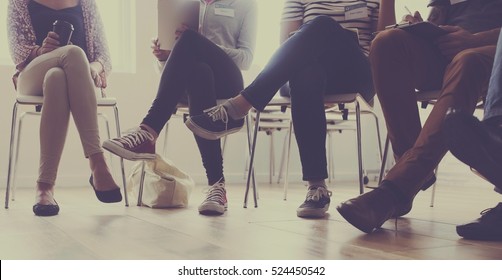 People sitting in a circle counseling