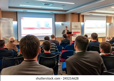 people sitting rear at the business conference - Powered by Shutterstock