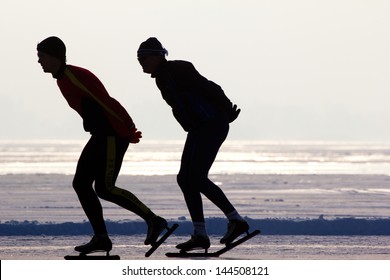 People skating on a frozen lake, Holland