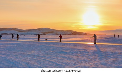 People Skiing On Frozen Lake Baikal