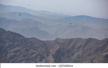 People Sliding Down Jebel Jais Mountain Via World's Longest Zip Line.