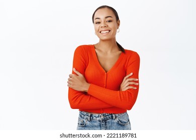 People. Smiling African American Girl Standing In Confident, Power Pose, Arms Crossed On Chest, White Background