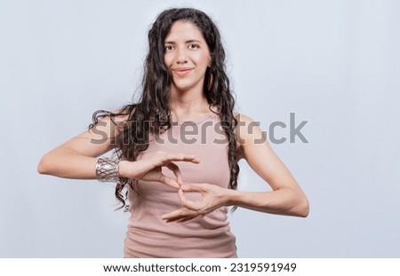 People speaking in sign language isolated. Young woman gesturing in sign language, Lating girl gesturing in sign language isolated