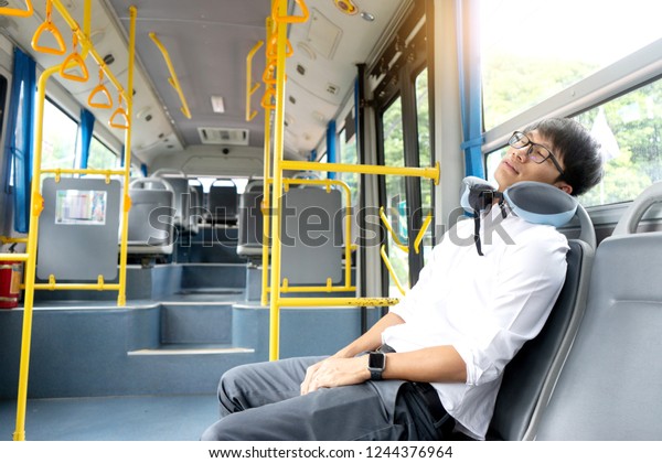 people spend a long time\
in the bus it be lifestyle for transportation in the city and some\
get some sleep