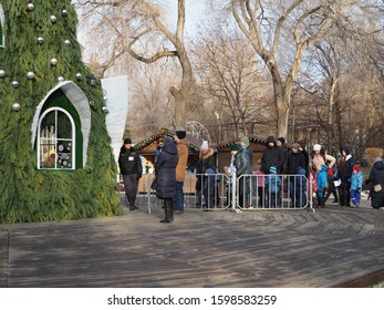 People Stand In Line At The House Of Santa Claus In The City Park. Russia, Saratov - December, 2019