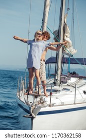 People standing bow sailing