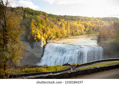 People Standing Overlooking Middle Falls At Letchworth State Park In Upstate New York