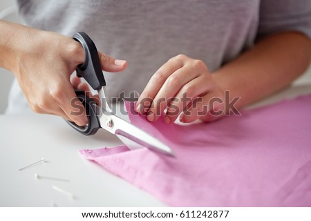 Similar – Image, Stock Photo Dressmaker cutting a cloth