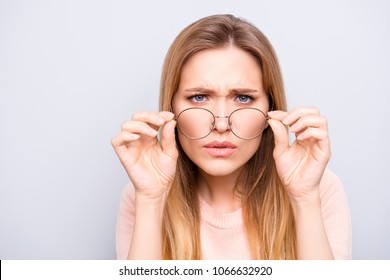 People style stylish health care healthcare  person doubt concept. Close up portrait of concentrated beautiful lady with bad vision  touching glasses trying to read text isolated on gray background