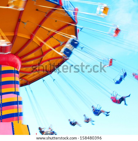 People Swing Past Motion Blur Shot Stock Photo Edit Now