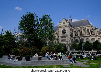 People Take A Lunch Break In A Park During A Hot Day In Paris, France On April 25, 2022.