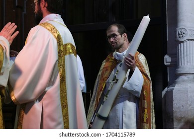 People Take Part In Easter Vigil Mass Behind Closed Doors In Catholic Church Of Sainte-Catherine In Brussels, Belgium, On Holy And Great Saturday, April 11, 2020. 