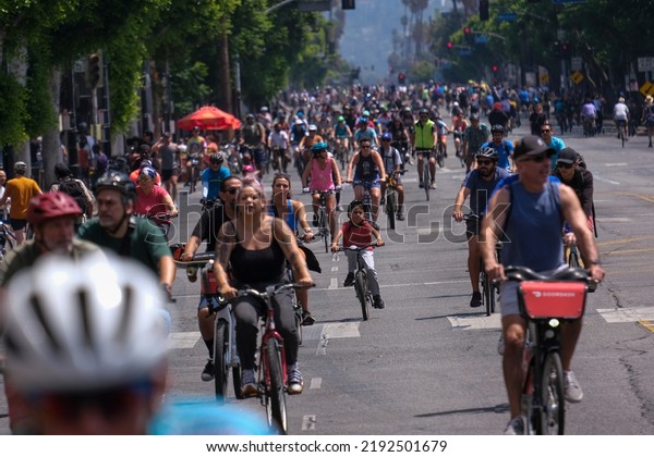 People\
take to the streets on their bikes, skateboards and other\
non-motorized forms of transportation for the car-free street\
CicLAvia event in Los Angeles Sunday, Aug., 2022.\
