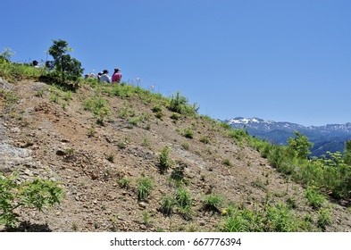 People taking a break while climbing
