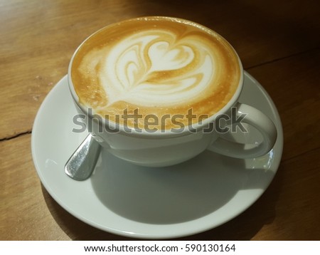 People talking in the cafe while having some fresh coffee