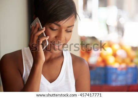 Similar – Black woman making the gesture of the horns