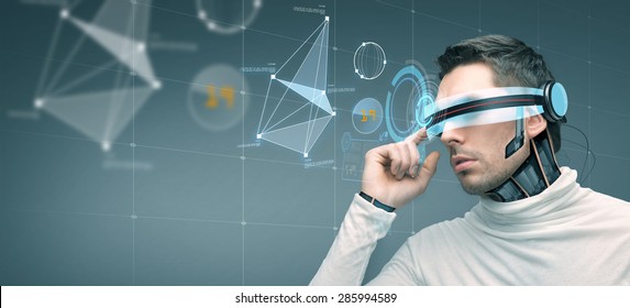 People, Technology, Future And Progress - Man With Futuristic 3d Glasses And Microchip Implant Or Sensors Over Gray Background With Virtual Screen