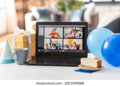 people, technology and online communication concept - laptop computer with happy family on screen having video call or virtual birthday party at home - Powered by Shutterstock