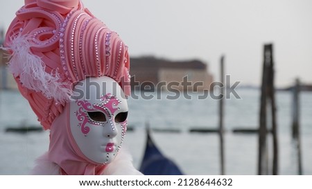 People with traditional constumes in Venice Carnival 2022