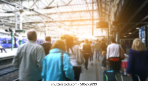 People at a train station platform theme, creative defocus and abstract motion blur  background with bokeh effect. Suitable for designs as background