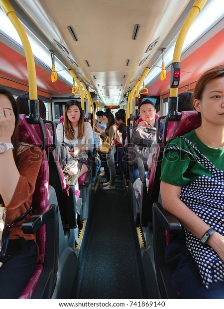  People are traveling on a double-decker\
bus to work in the morning, photo taken on a bus from Kowloon to\
Hong Kong Island in Hong Kong, 26 October\
2017